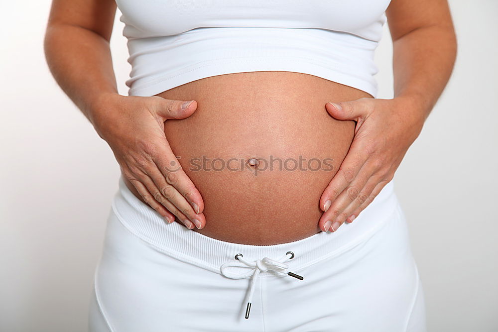 Similar – Image, Stock Photo Pregnant woman exercising at home sitting on the fitball