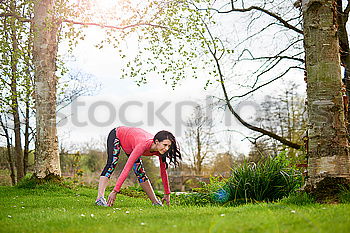 Similar – Image, Stock Photo Woman warming up before outdoor workout