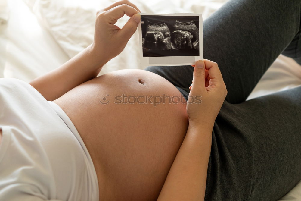 Similar – Image, Stock Photo pregnant woman sitting on the bench