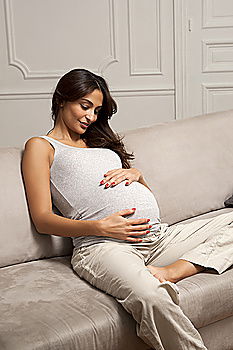 Similar – Pregnant woman touching her belly