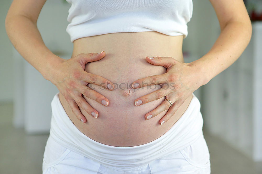 Similar – Image, Stock Photo Pregnant woman exercising at home sitting on the fitball