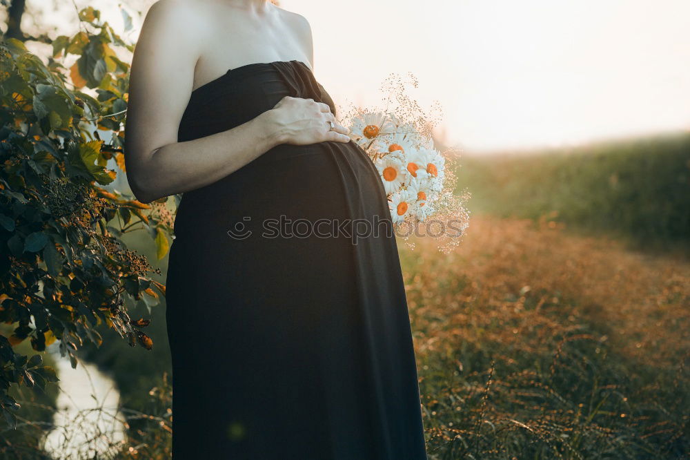 Similar – A Young Woman Standing in the Woods