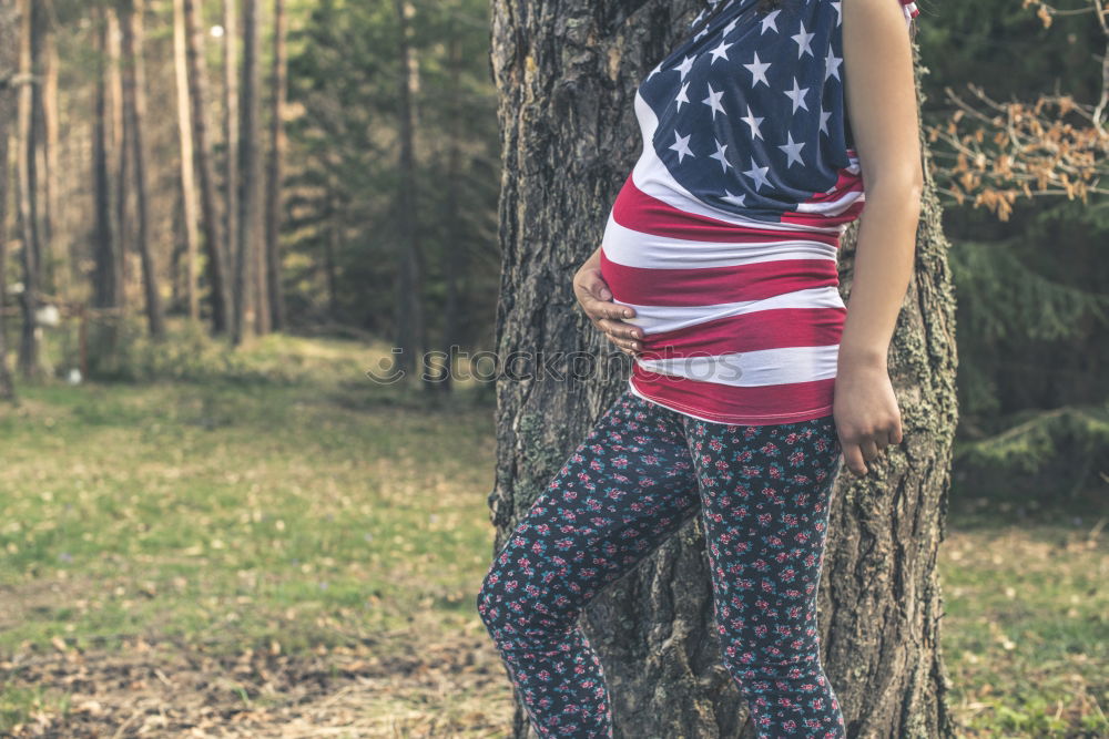 Similar – Teenage girls holding USA flag outdoor