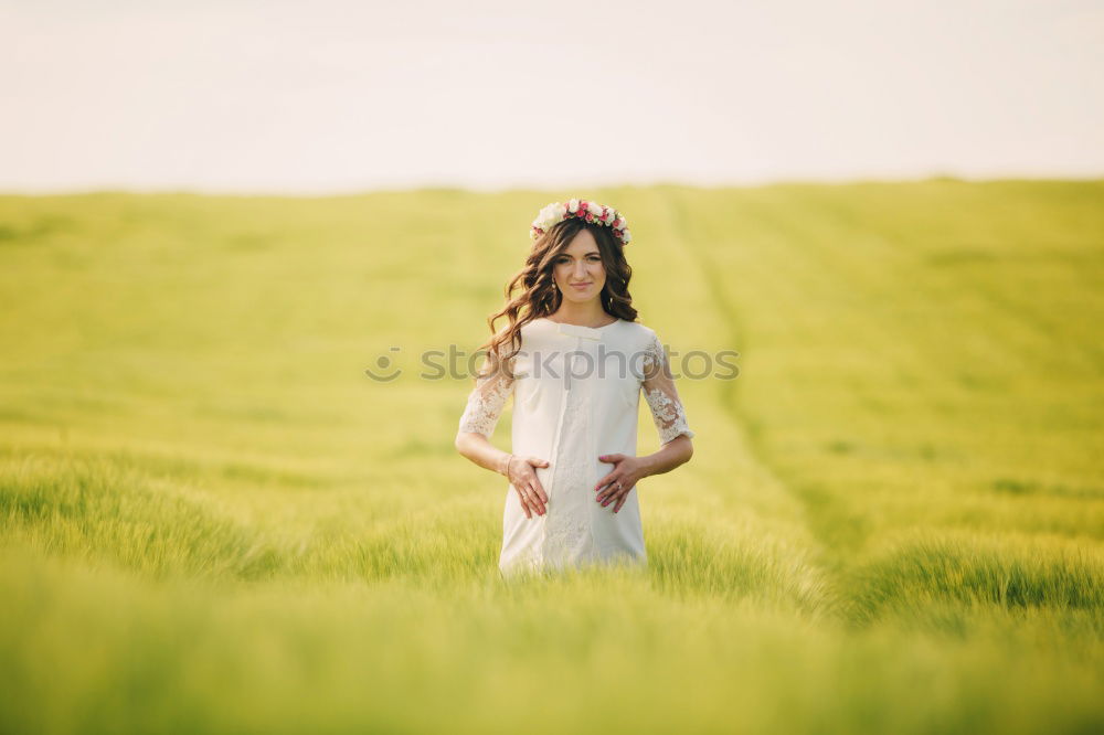 Similar – Woman in a green cornfield