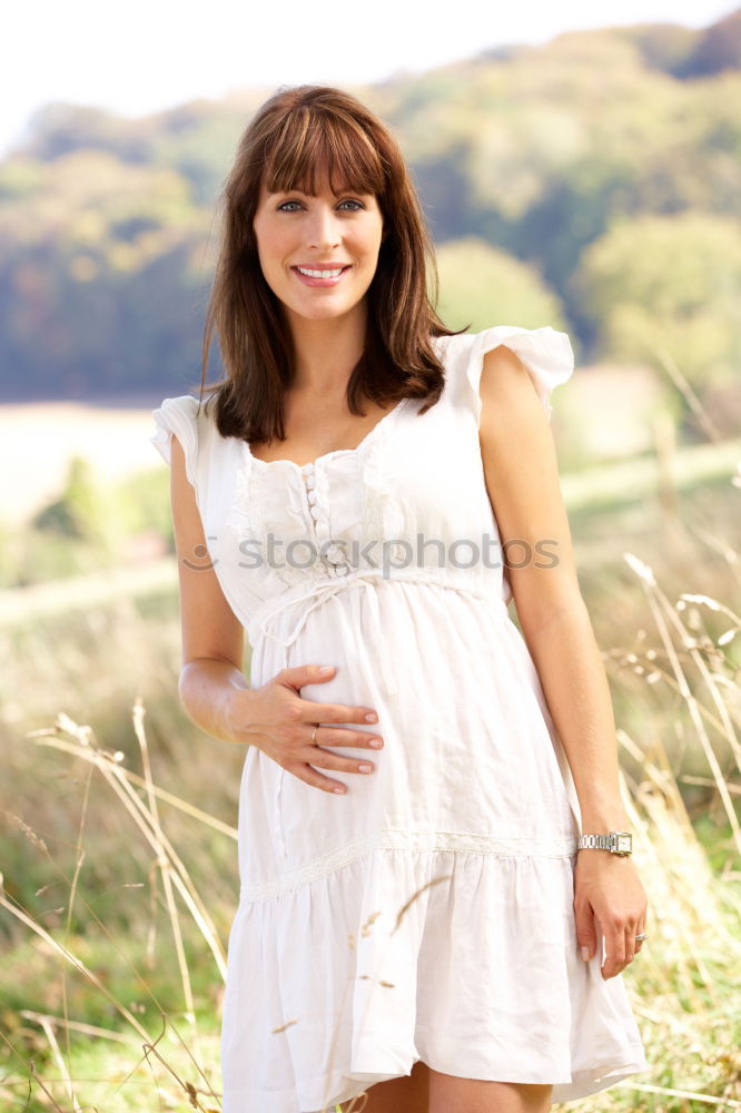 Similar – Image, Stock Photo Portrait of a pregnant woman in autumn