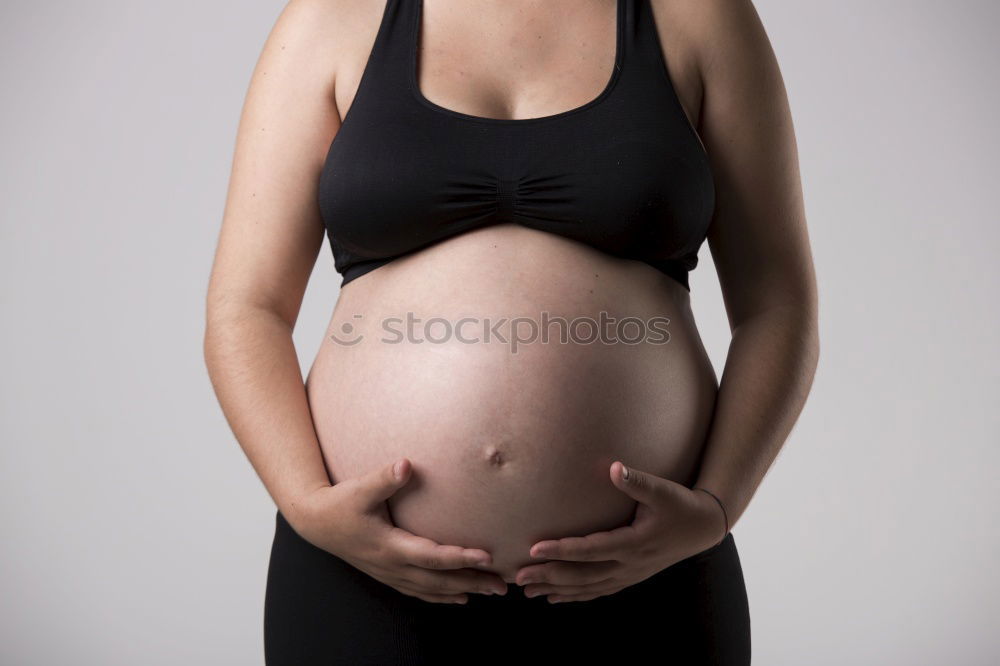 Similar – Who am I? Young woman holding a round mirror in front of her body. The mirror is showing her blurred face.