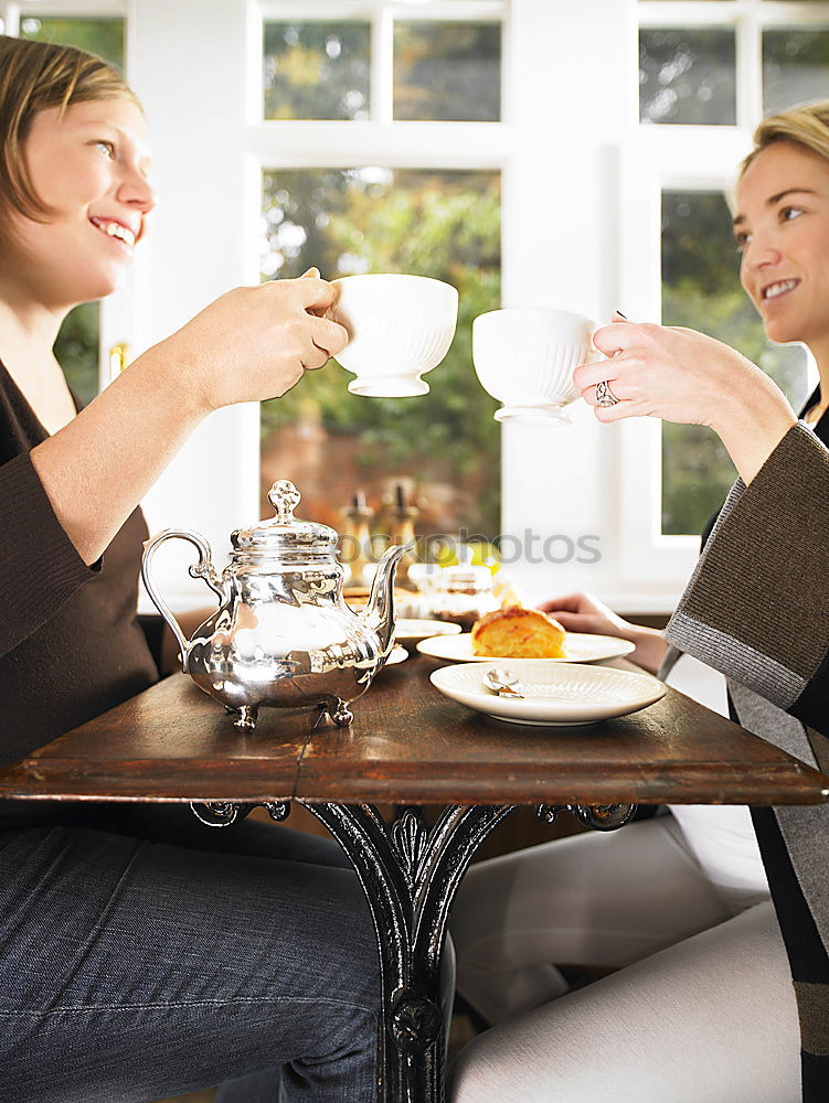 Young beautiful woman is making coffee in country house.