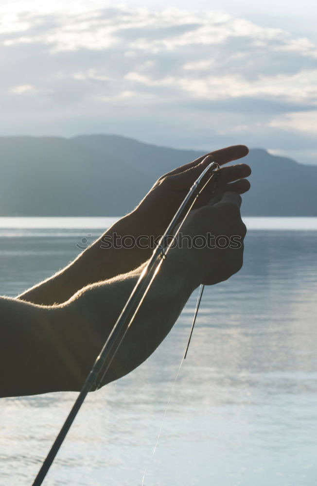 Similar – Man on fishing with rod