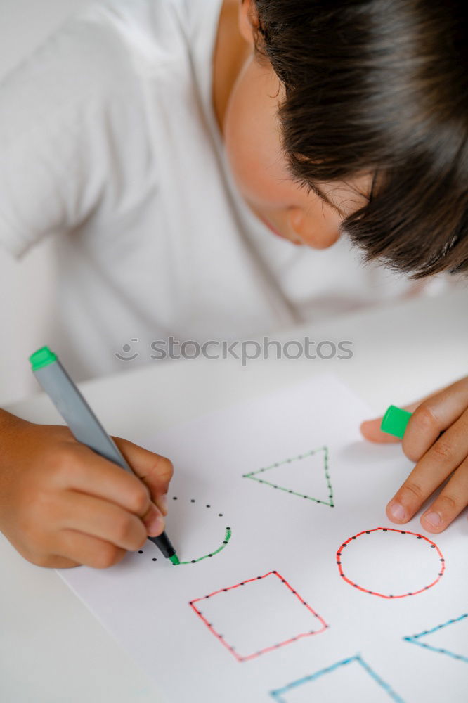 Similar – Image, Stock Photo Girl coloring a simple sketch of a skull