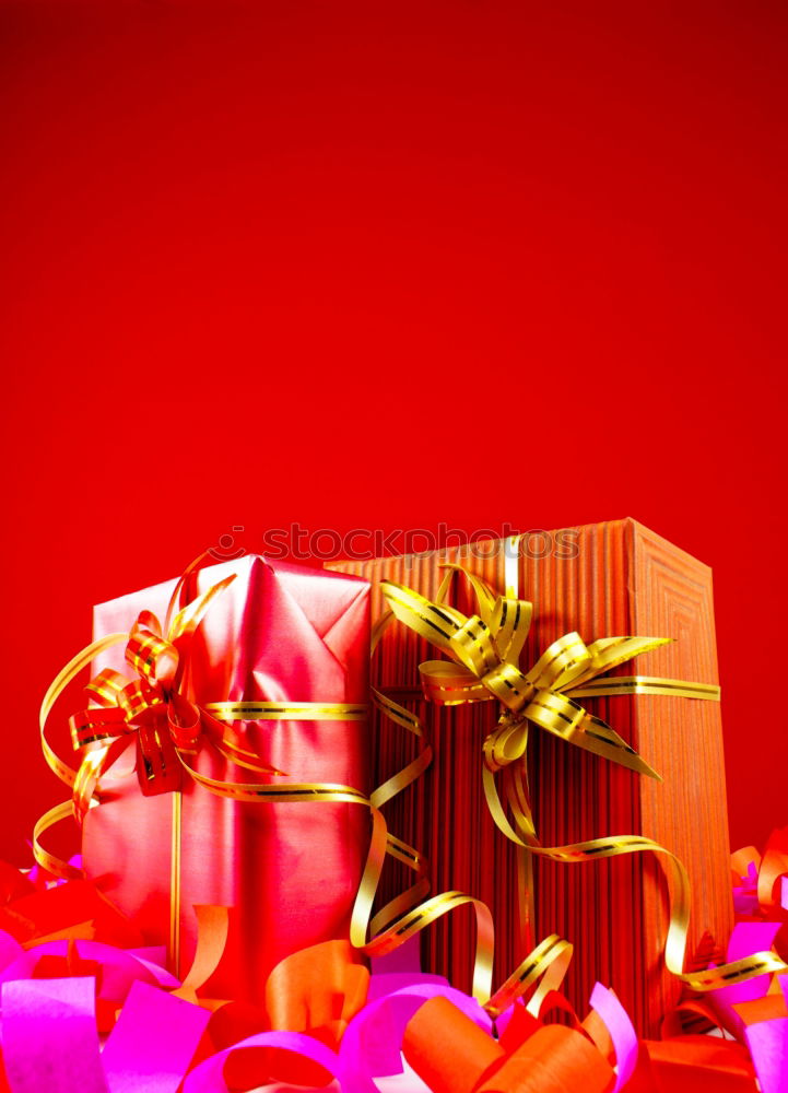 Similar – Christmas gifts presents on red glitter background. Copyspace