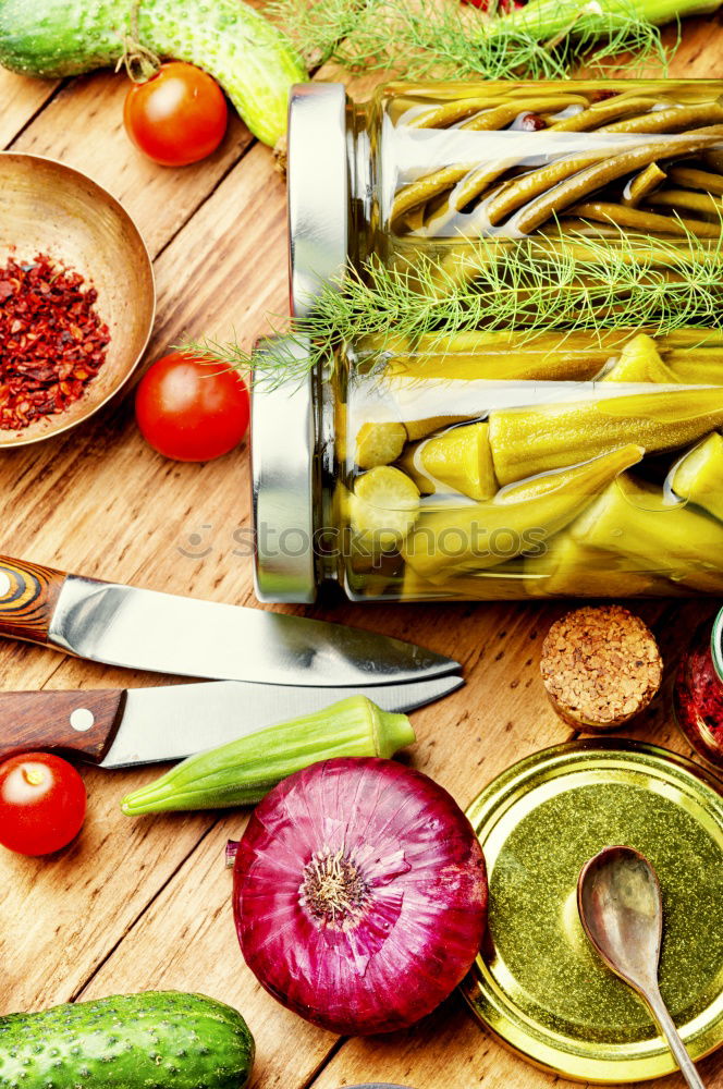 Similar – Vegetables and utensils on kitchen table