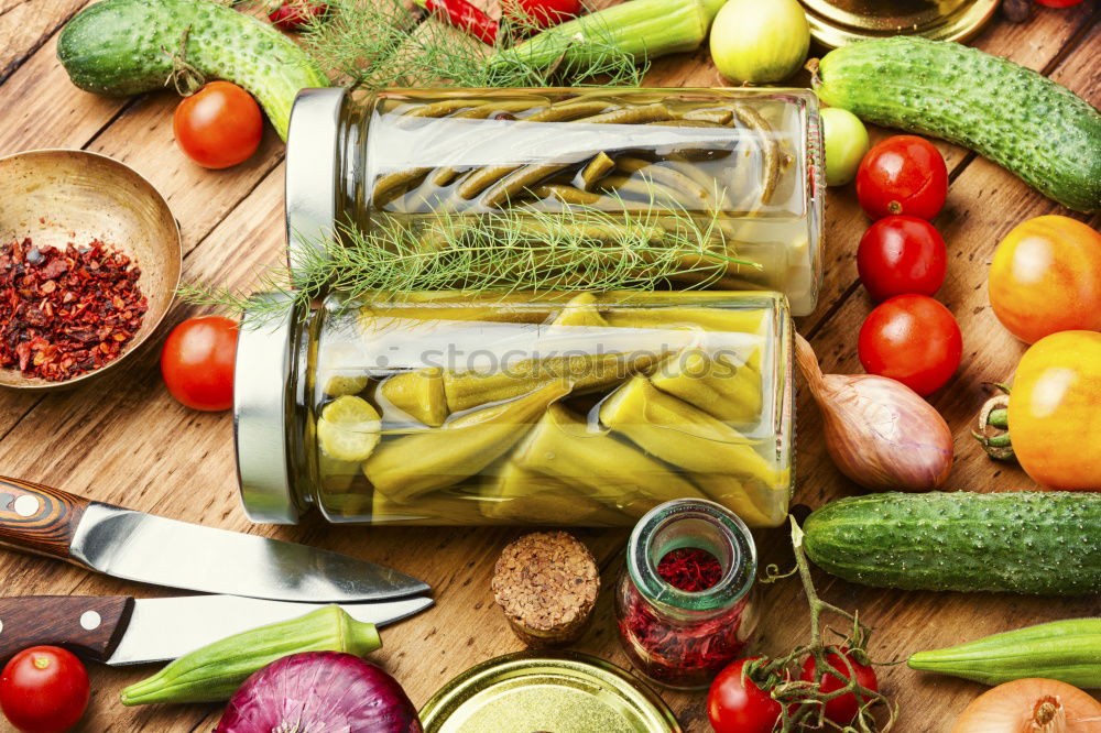 Similar – Vegetables and utensils on kitchen table