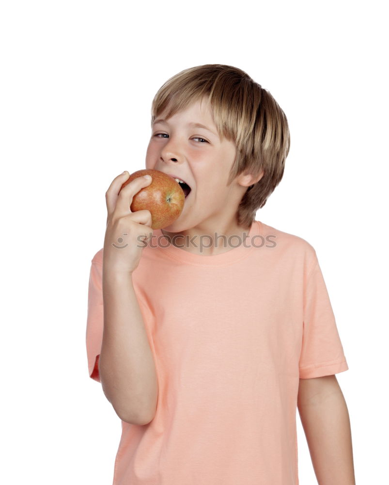 long-haired boy enjoys marble cake