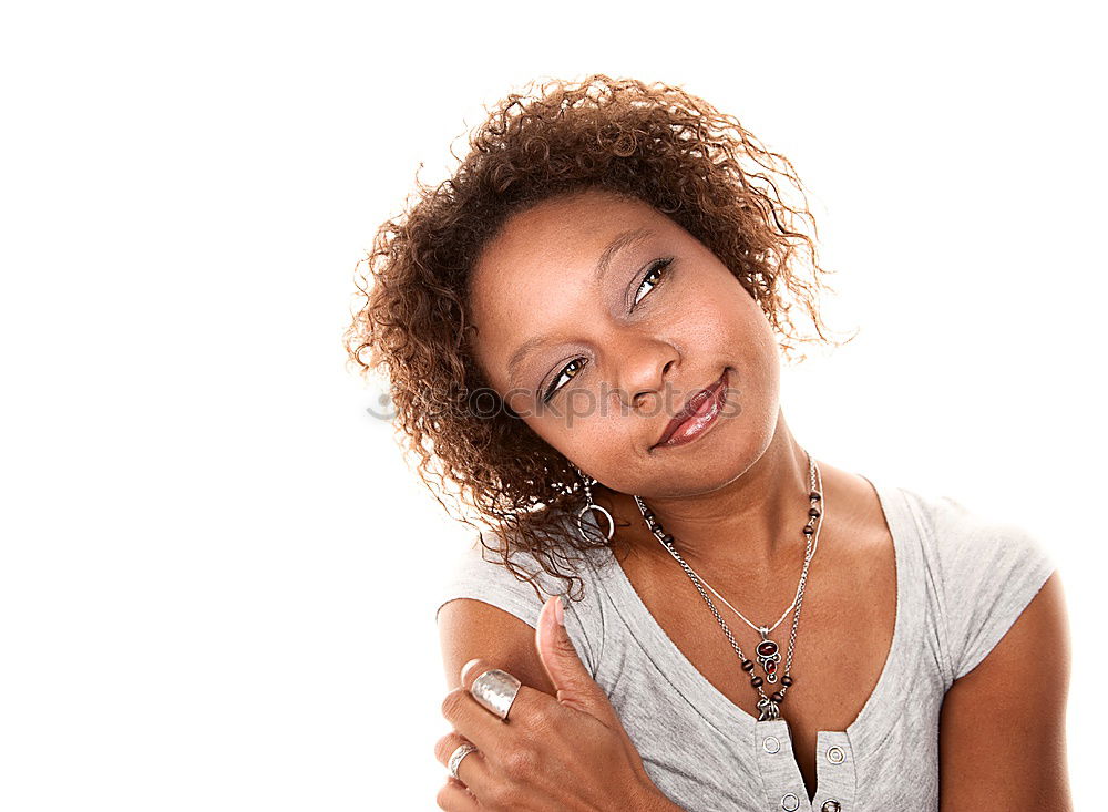 Similar – Image, Stock Photo Beautiful African woman from Togo with very short hair, slightly opened mouth, one earring with pearl in a white and pink striped fine shirt with collar from below in half profile