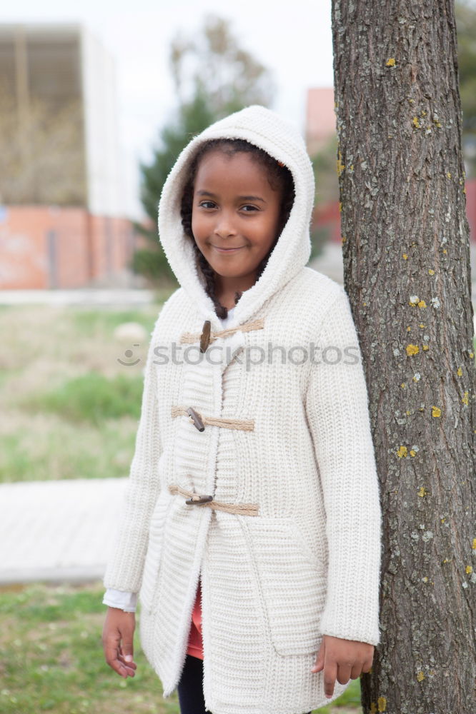 Similar – Young black woman, afro hairstyle, standing in the street