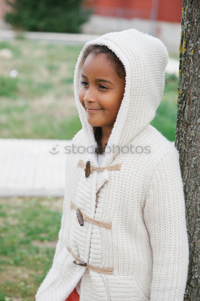 Similar – Image, Stock Photo girl with colorful nails wrapped in a white woolen scarf