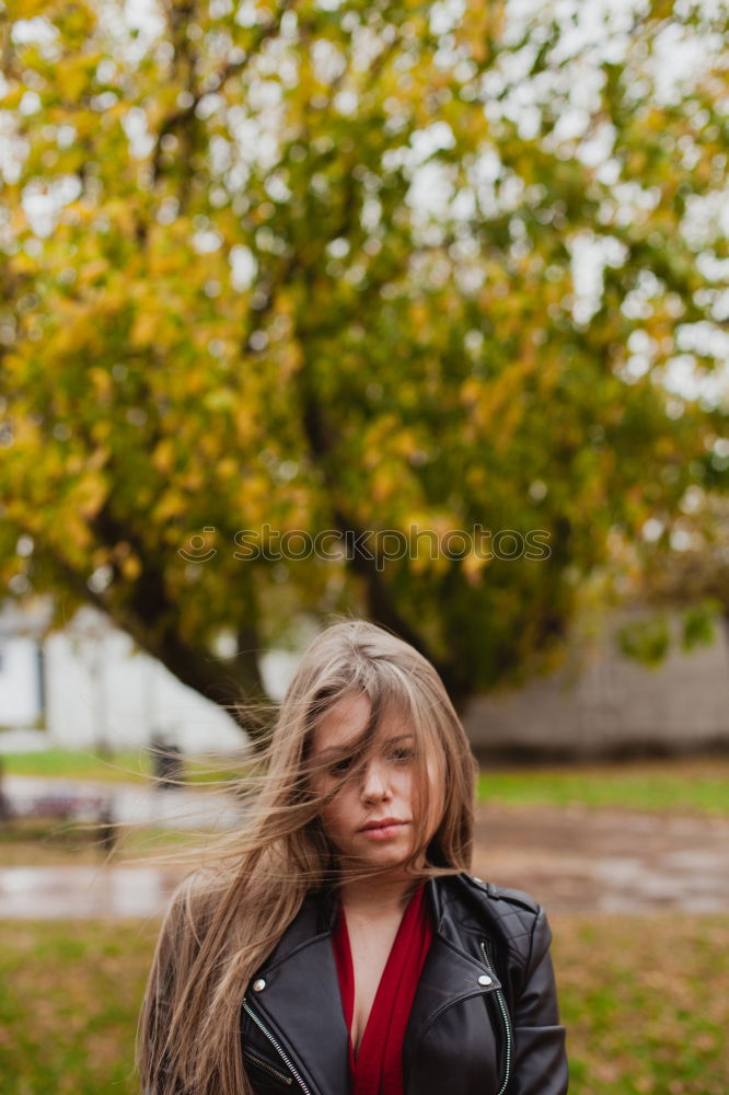 Similar – Image, Stock Photo Pretty blonde girl with leather jacket in the street