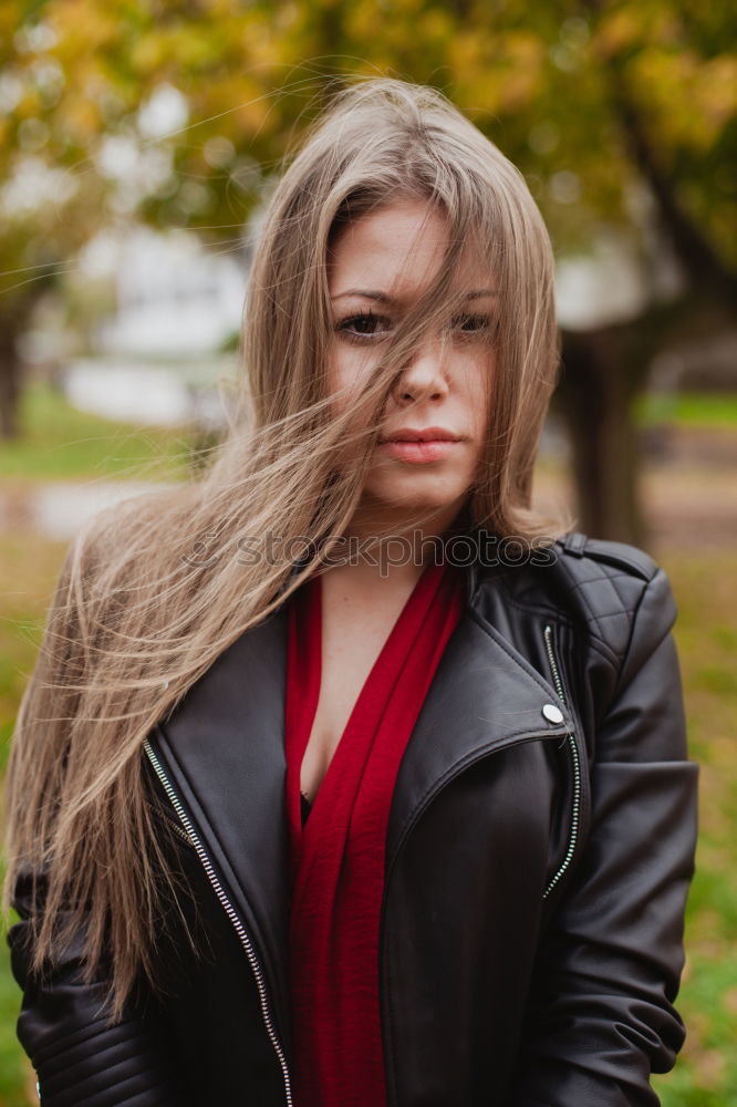 Similar – waiting underground- brunette young woman with black leather jacket waiting in underpass