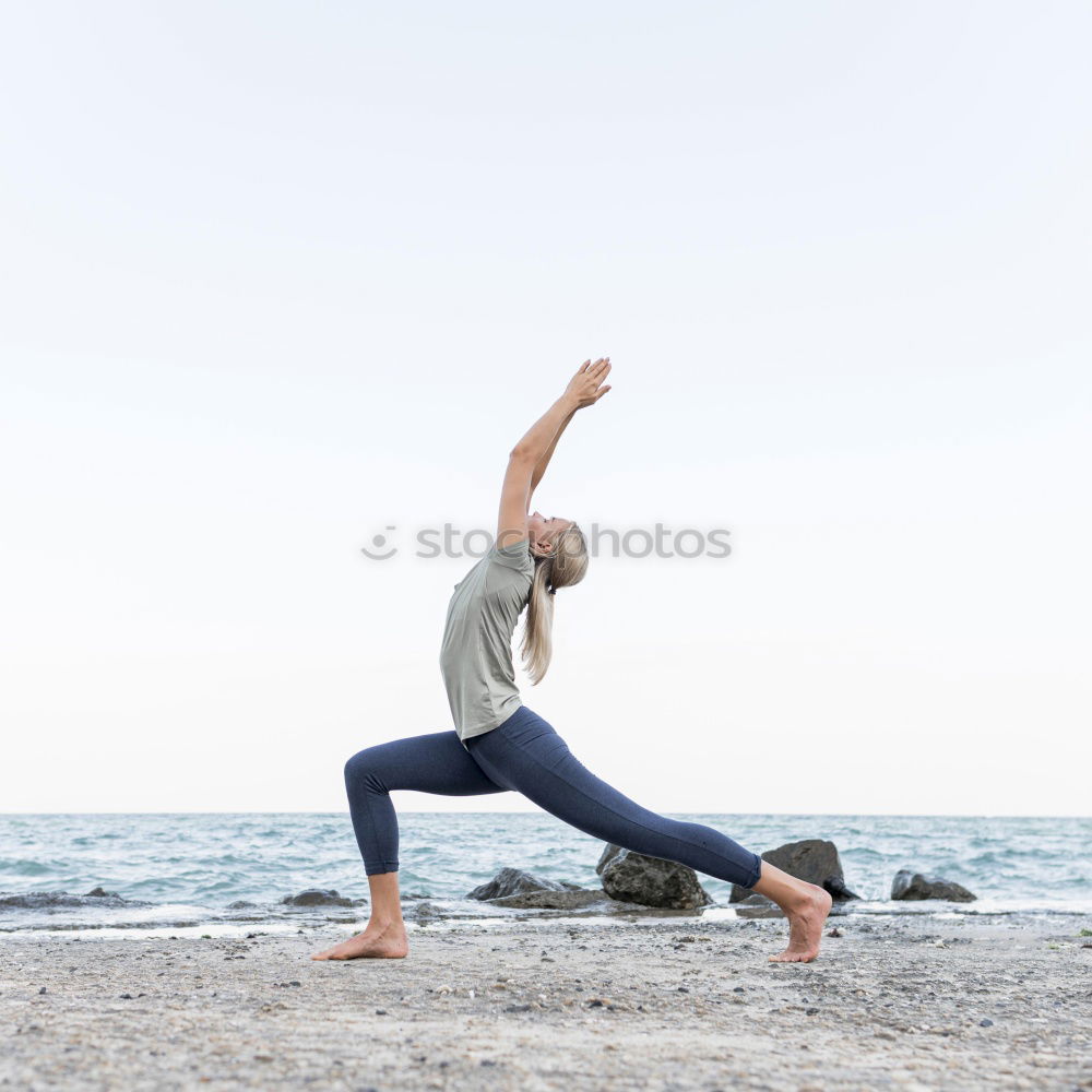 Image, Stock Photo Yoga students showing different yoga poses. Warrior II and a smile into the camera