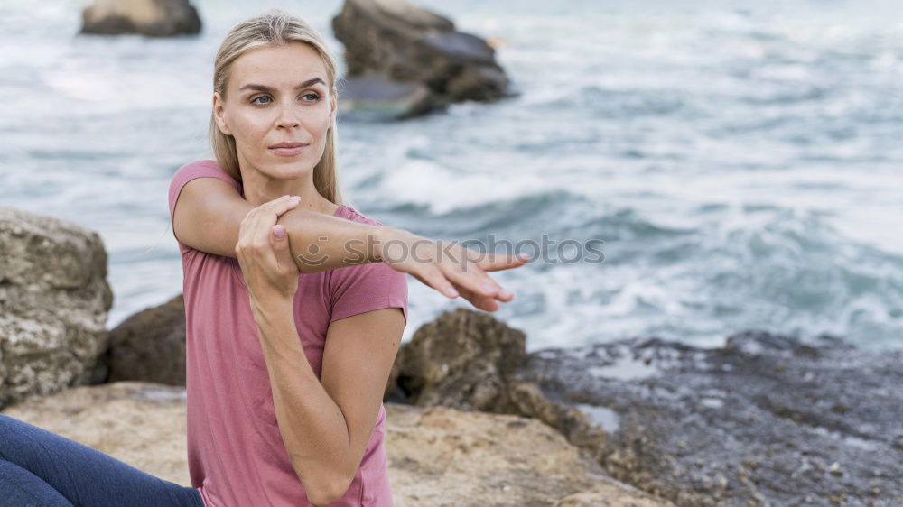 Young woman on a jetty Joy