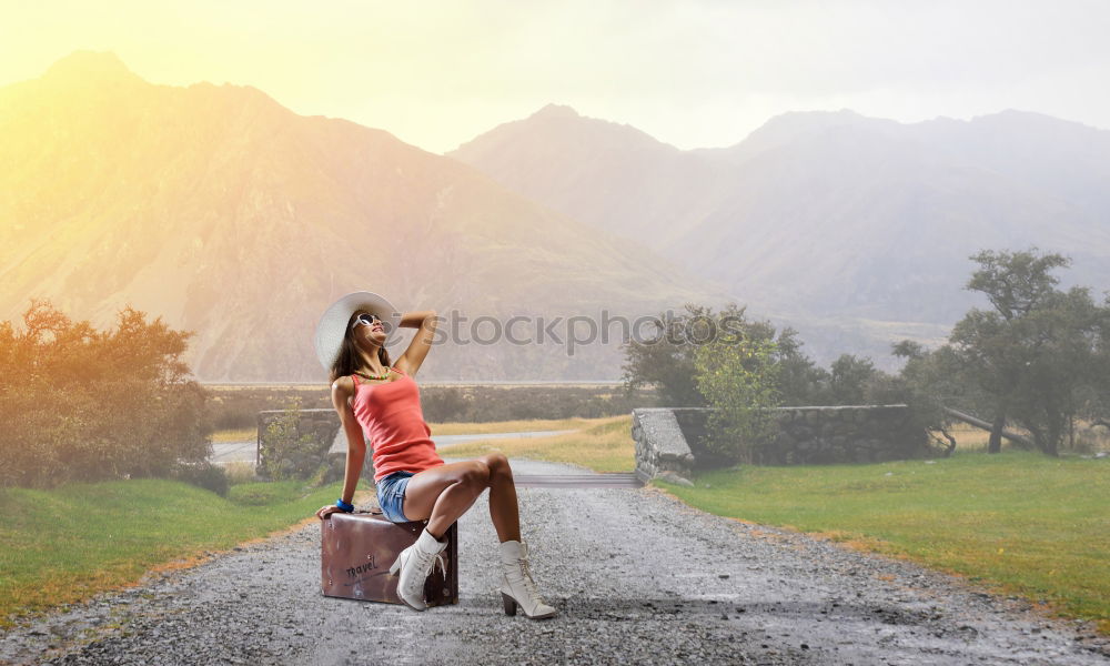 Similar – Boy with suitcase on the road