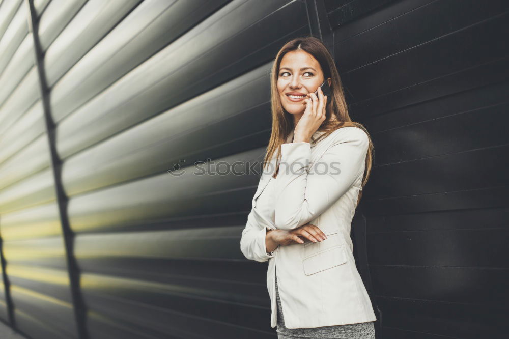 Similar – business woman using a telephone