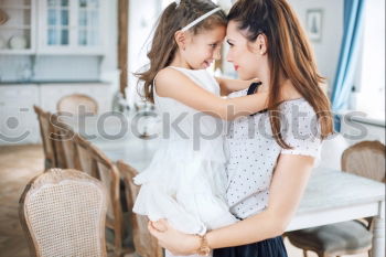 Similar – Image, Stock Photo Mother and Son cuddling at home