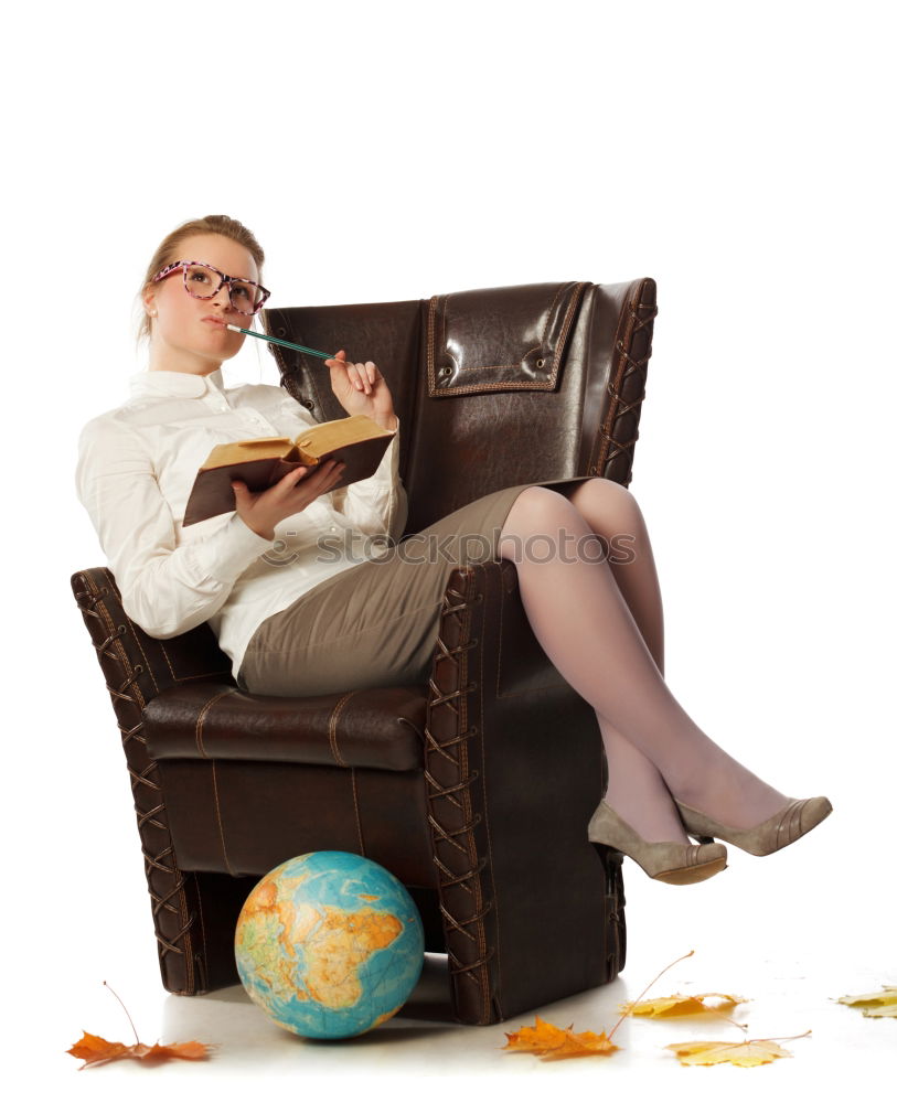 Similar – Girl sitting by the map in classroom