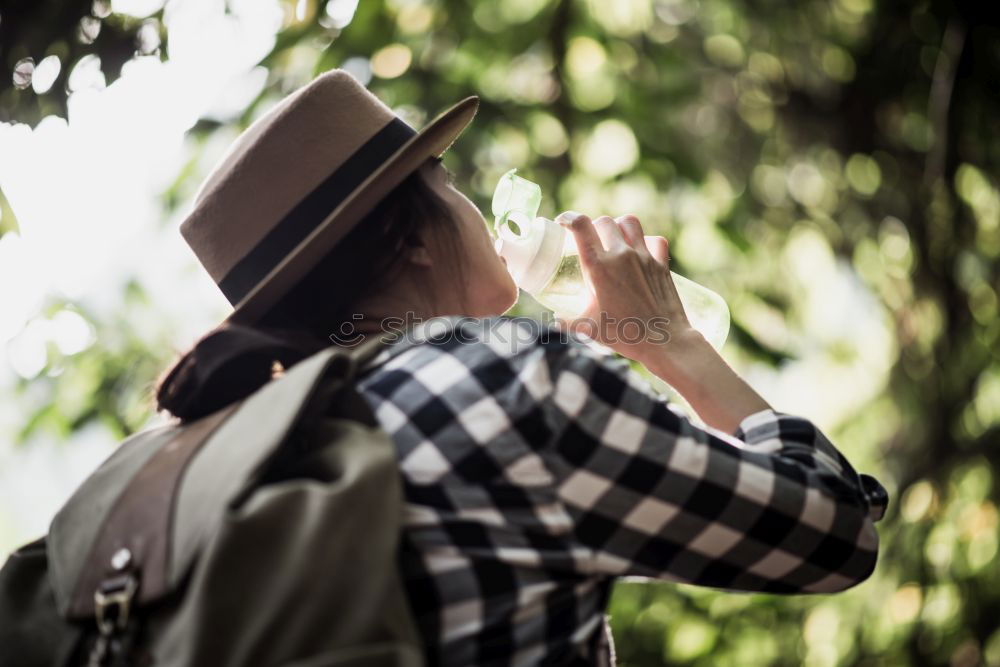 Similar – Image, Stock Photo Young hiking woman taking notes in the nature