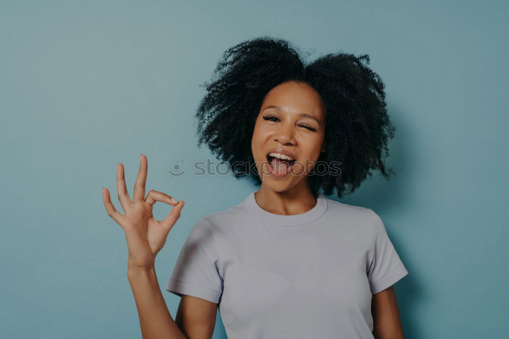 Similar – close up of a pretty black woman with curly hair smelling a rose flower sit on bed