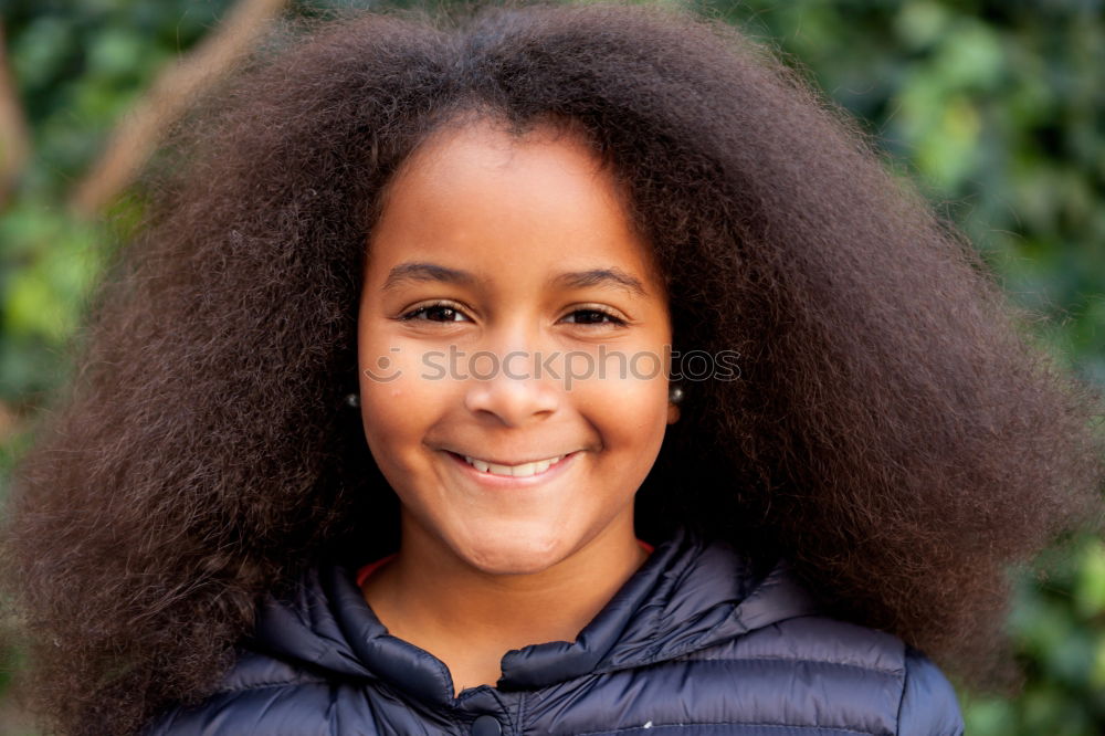 Similar – Image, Stock Photo Pretty girl with long afro hair with a blue coat