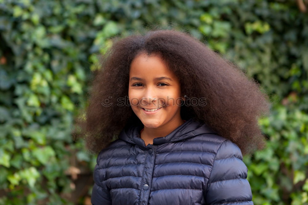 Similar – Image, Stock Photo Pretty girl with long afro hair with a blue coat