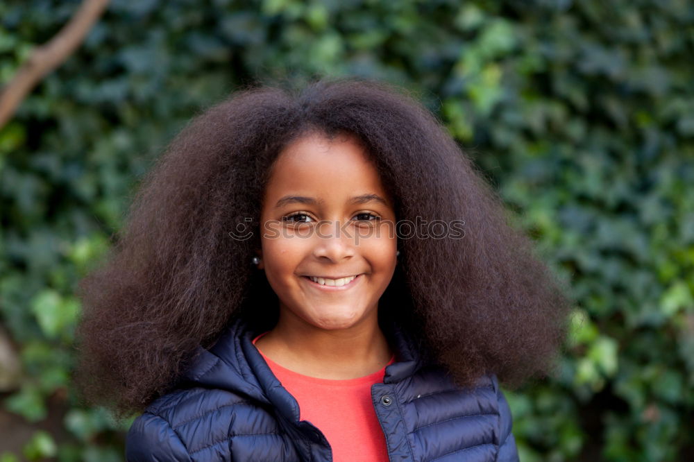 Similar – Image, Stock Photo Pretty girl with long afro hair with a blue coat