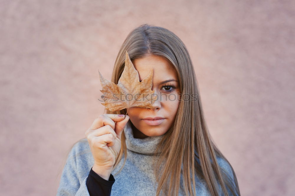 Similar – Image, Stock Photo Beautiful young woman holding a red heart