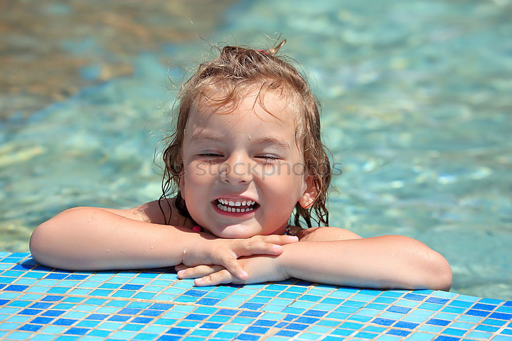 Similar – Kid in snorkel mask posing on poolside