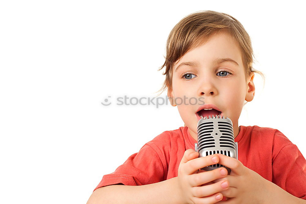 Similar – Boy singing to microphone