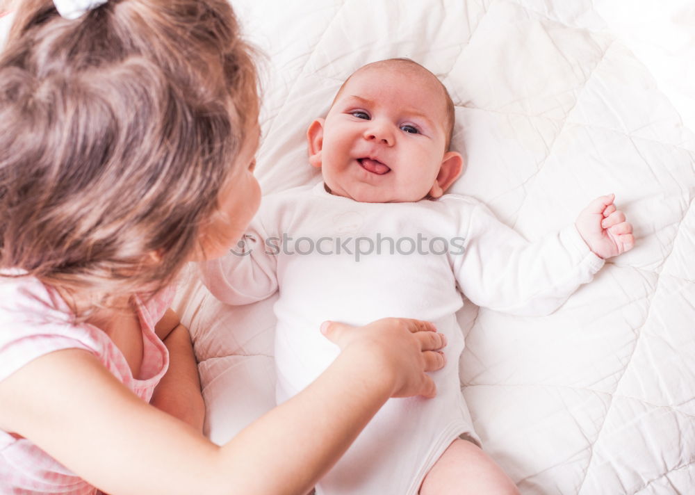 Similar – cute happy child girl relaxing at home on the bed