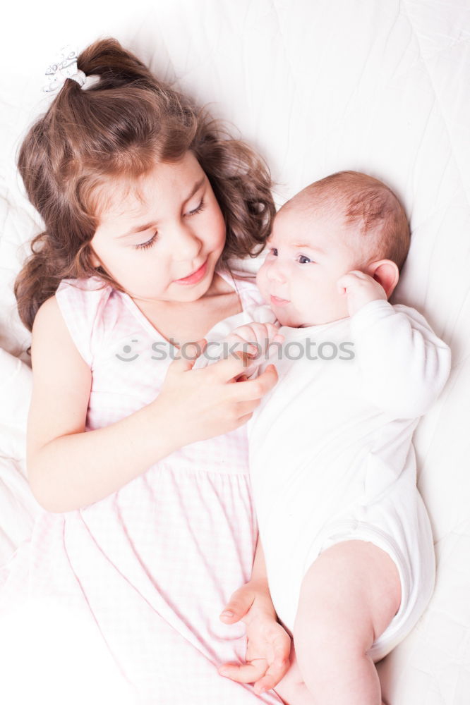 Similar – cute happy child girl relaxing at home on the bed