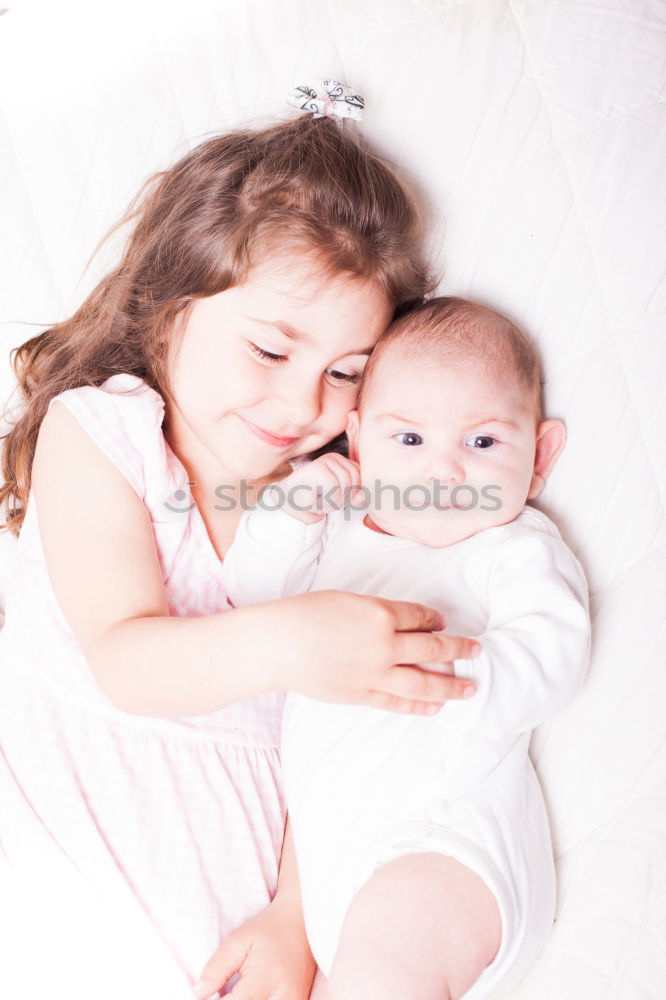 Similar – cute happy child girl relaxing at home on the bed