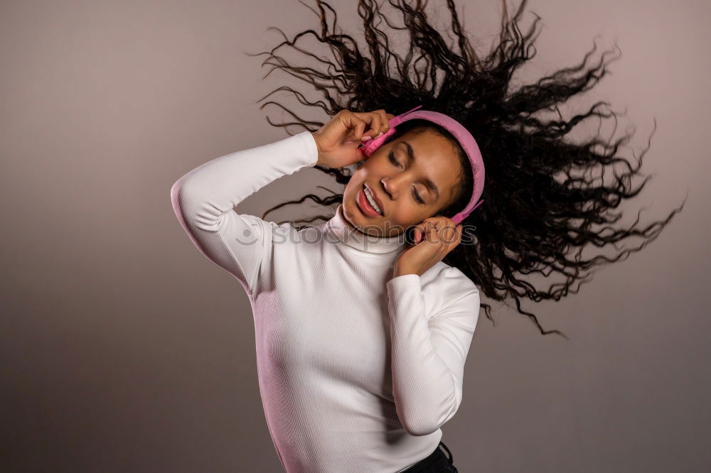 Similar – Image, Stock Photo Mixed woman with afro hairstyle sitting in urban park
