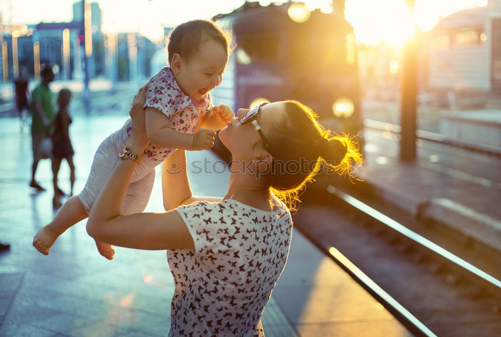 Similar – Image, Stock Photo Happy mother and son having fun on beach on vacation