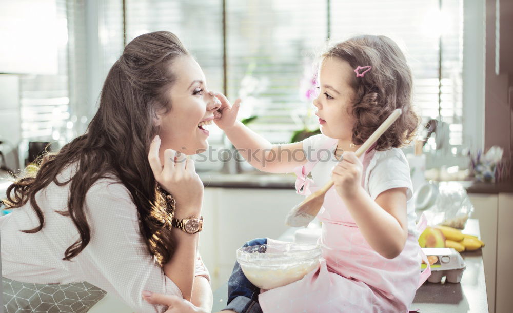 Similar – Image, Stock Photo toddler girl with pregnant mother at home