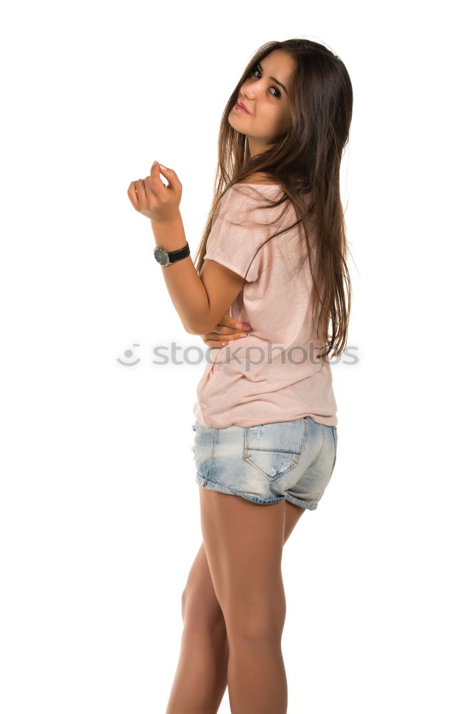 Similar – Image, Stock Photo Young, slim, athletic woman stands barefoot with hotpants in the room and looks at the ceiling with laughter