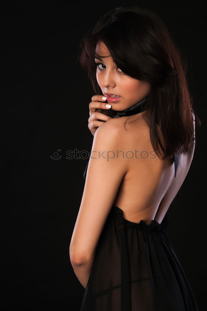 Similar – sexy woman smiling on black background