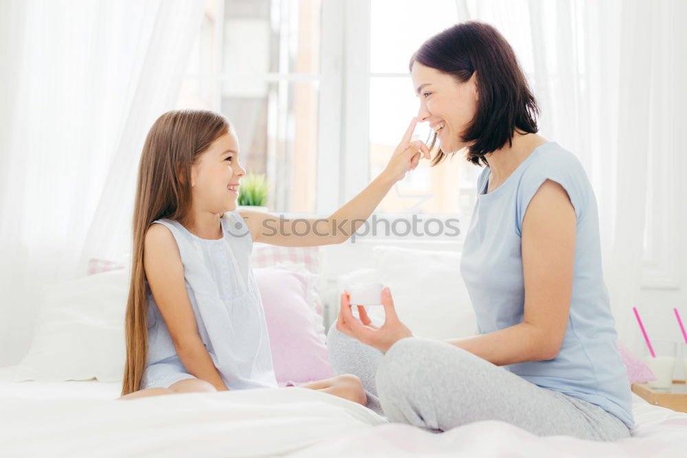 Similar – happy child boy giving flowers to mom