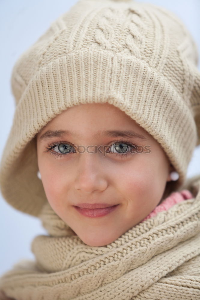 Similar – Pretty girl with wool hat in a park