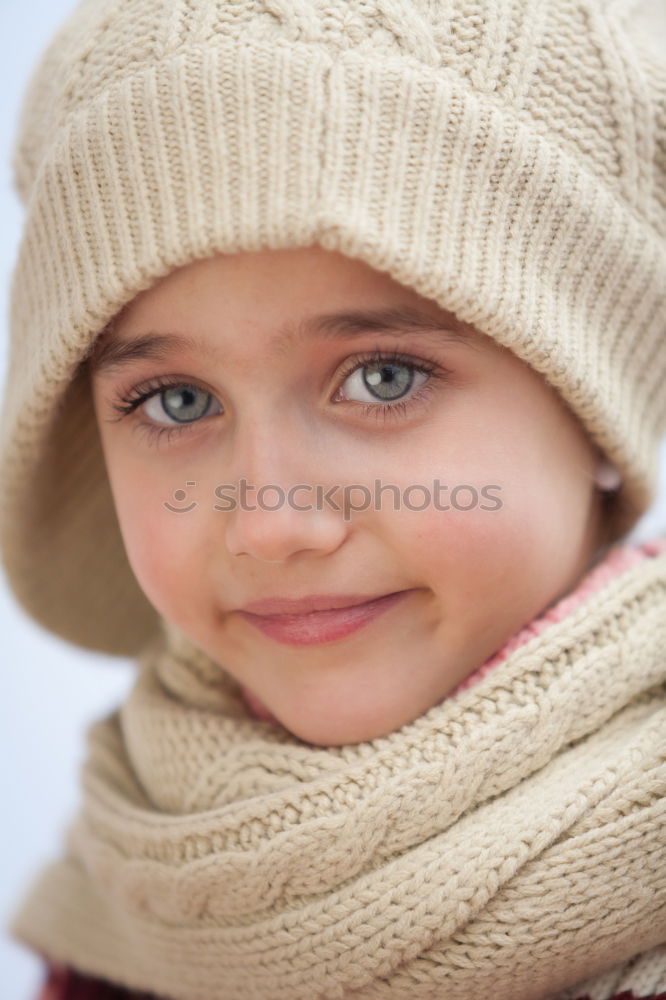 Similar – Pretty girl with wool hat in a park