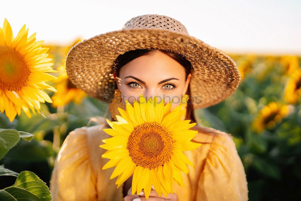 Similar – Image, Stock Photo Young woman with yellow dress and hat walks in the countryside.