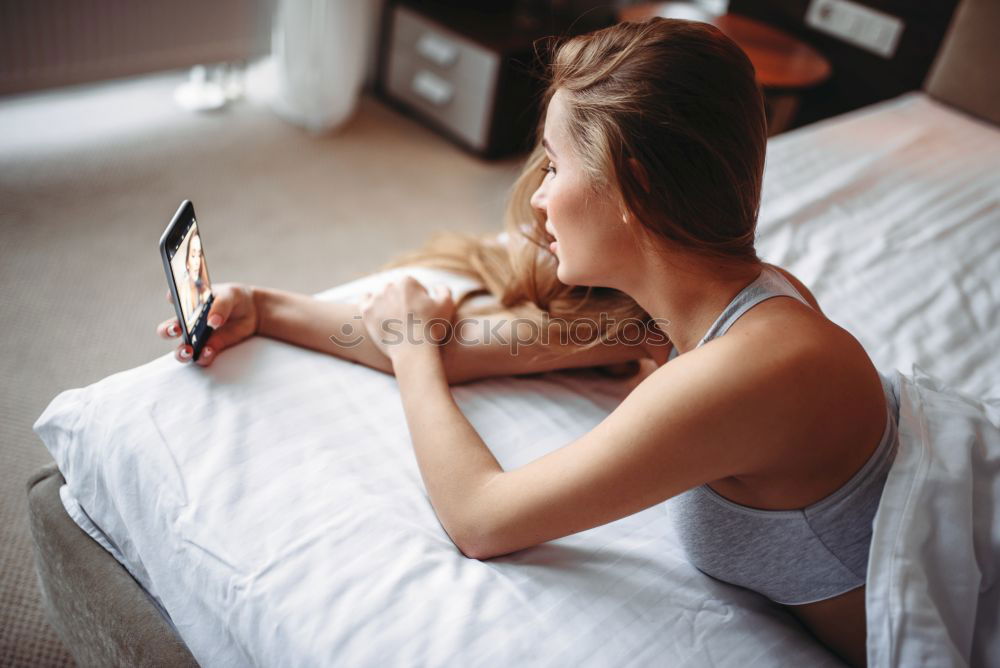 Similar – woman on bed enjoying a cup of coffee. morning