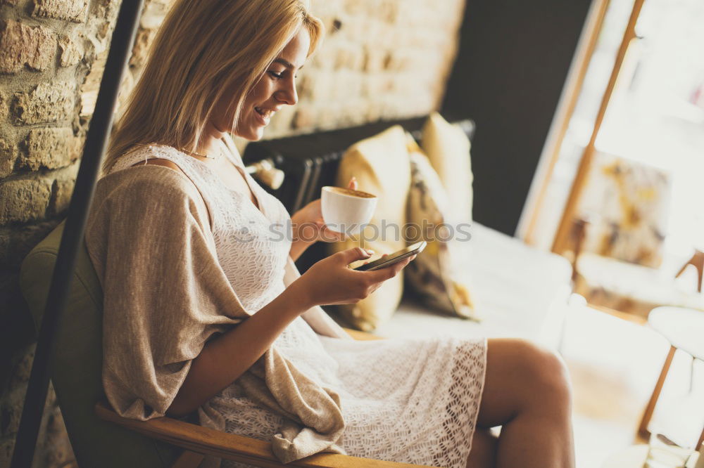 Similar – Image, Stock Photo Happy woman using smartphone at a wooden wall